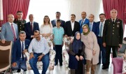 BAKAN EROĞLU,MİLLETVEKİLLERİ VE BAŞKAN KUMARTAŞLI ŞEHİT AİLEMİZİ ZİYARET ETTİ. 