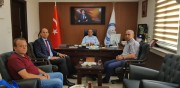 BAŞKAN İSMAİL KUMARTAŞLI'DAN KIZILÖREN KAYMAKAMI ADEM CAN'A ZİYARET